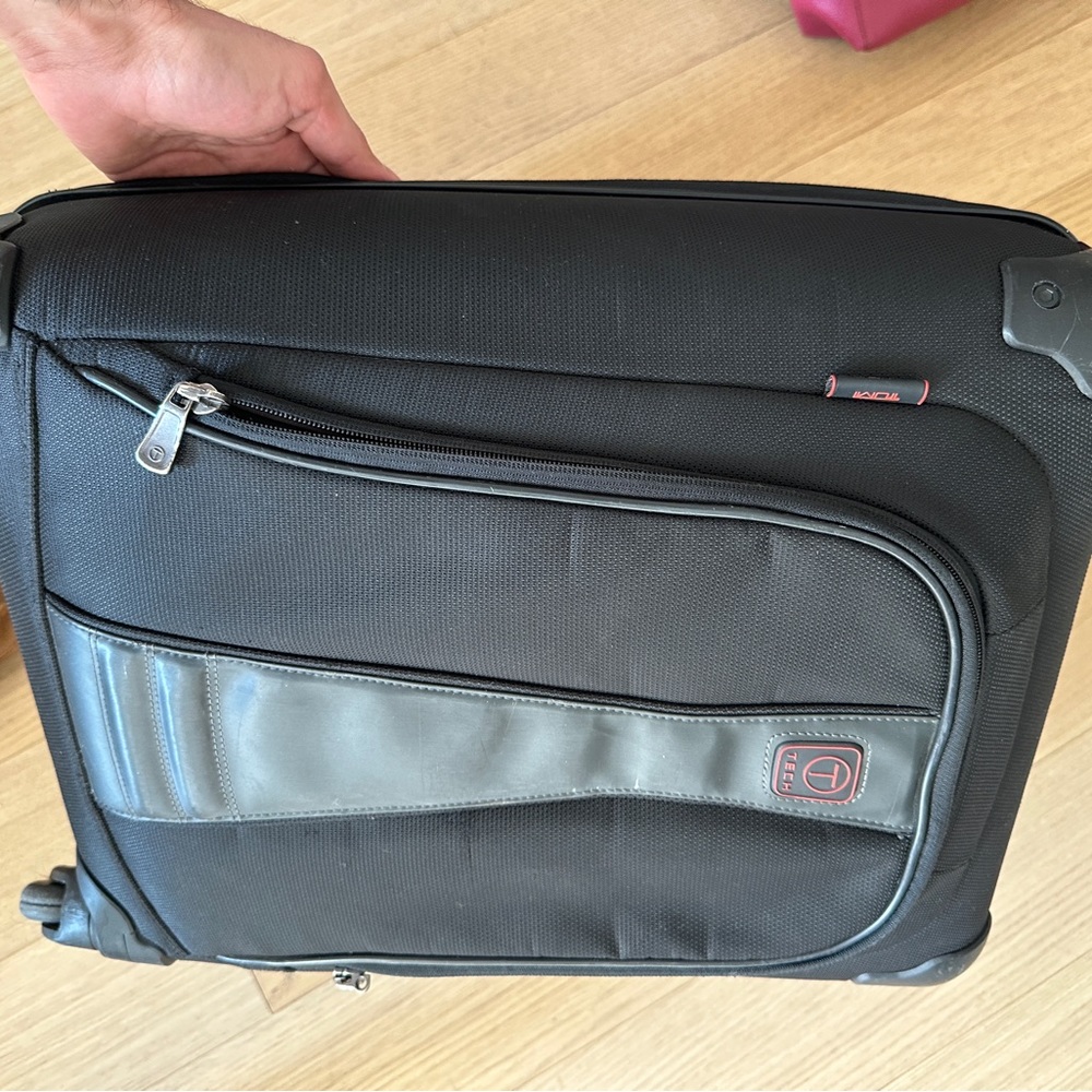 Tumi T-tech 4-wheel carry-on